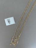 Collar Multicadena Dorado con Dijes