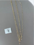 Collar Multicadena Dorado con Eslabones y Dijes