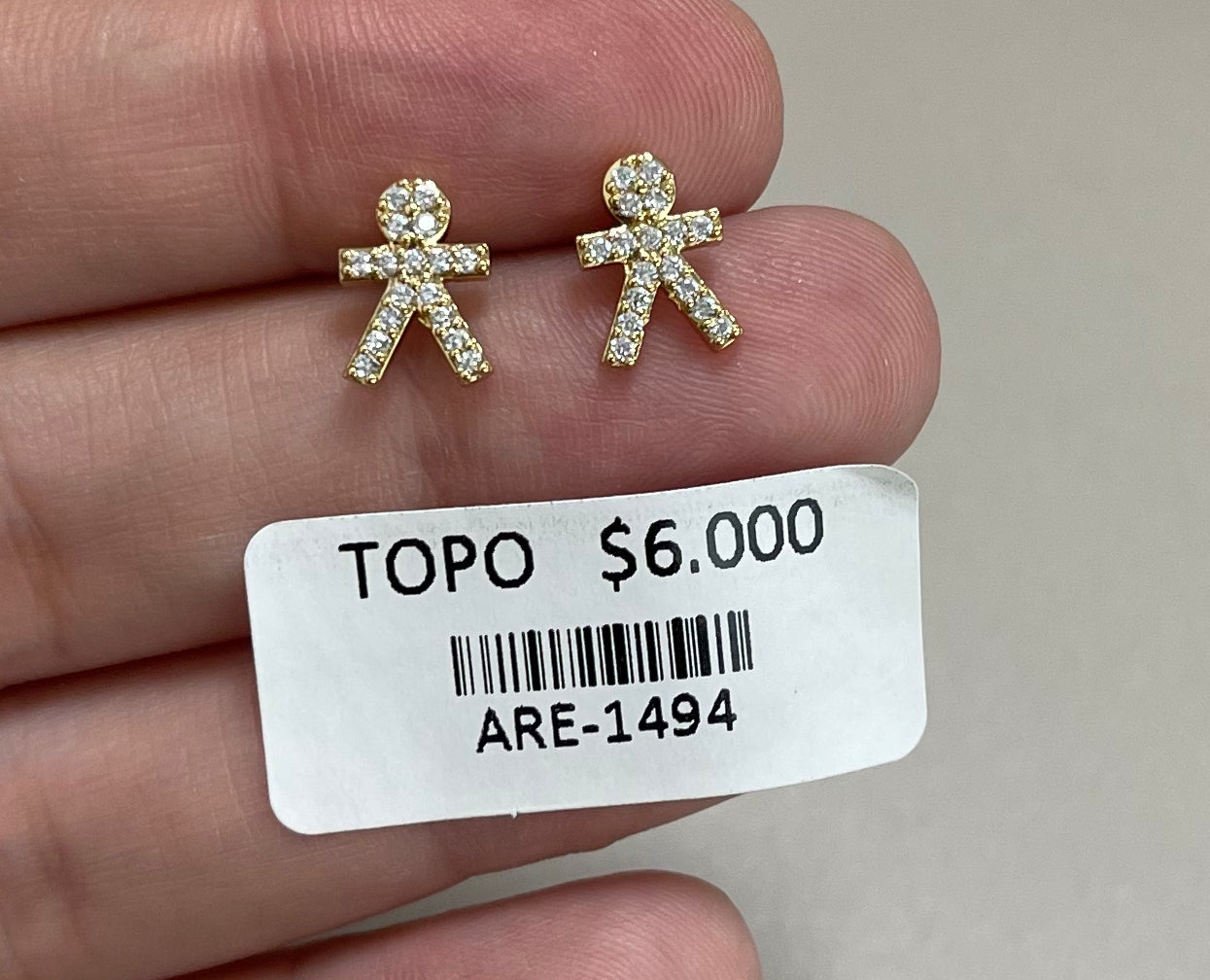 Aretes Dorados Forma de Niño con Brillos