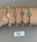 Brazalete con Motivos Ovalados y Piedras de Color