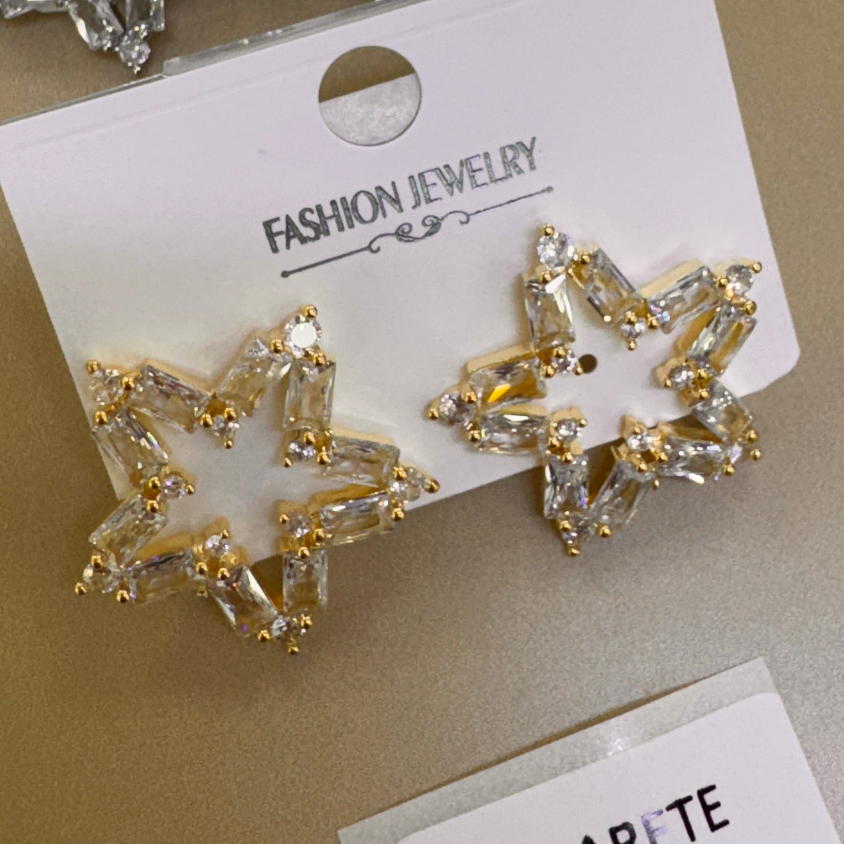 Aretes Estrella Abierta con Cristales Transparentes
