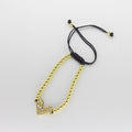 Pulsera Tejida de Esferas Doradas con Corazón Calado
