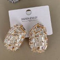 Aretes Ovalados con Piedras en diferentes Orientaciones