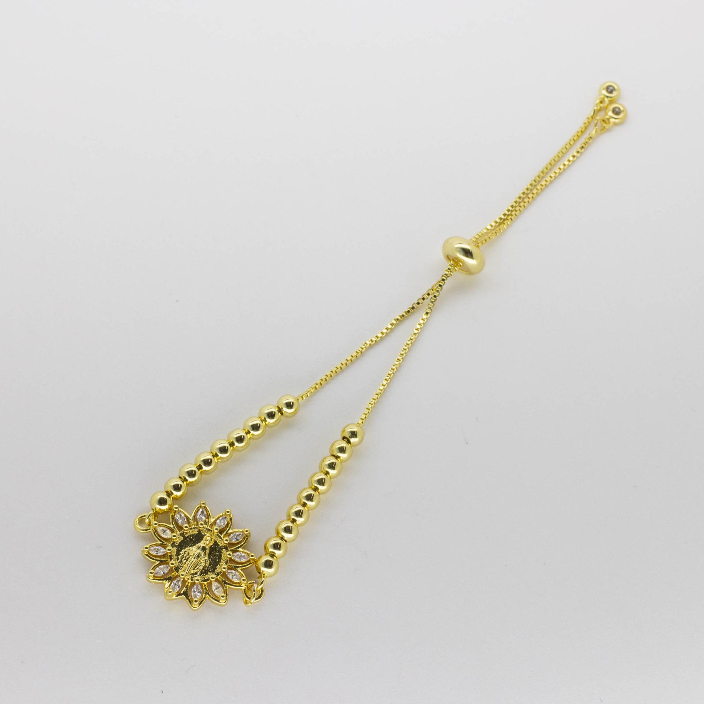 Pulsera Ajustable Dorada con Dije de Sol Religioso y Cristales