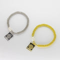 Pulsera Tejida de Balines con Dije San Benito Pergamina