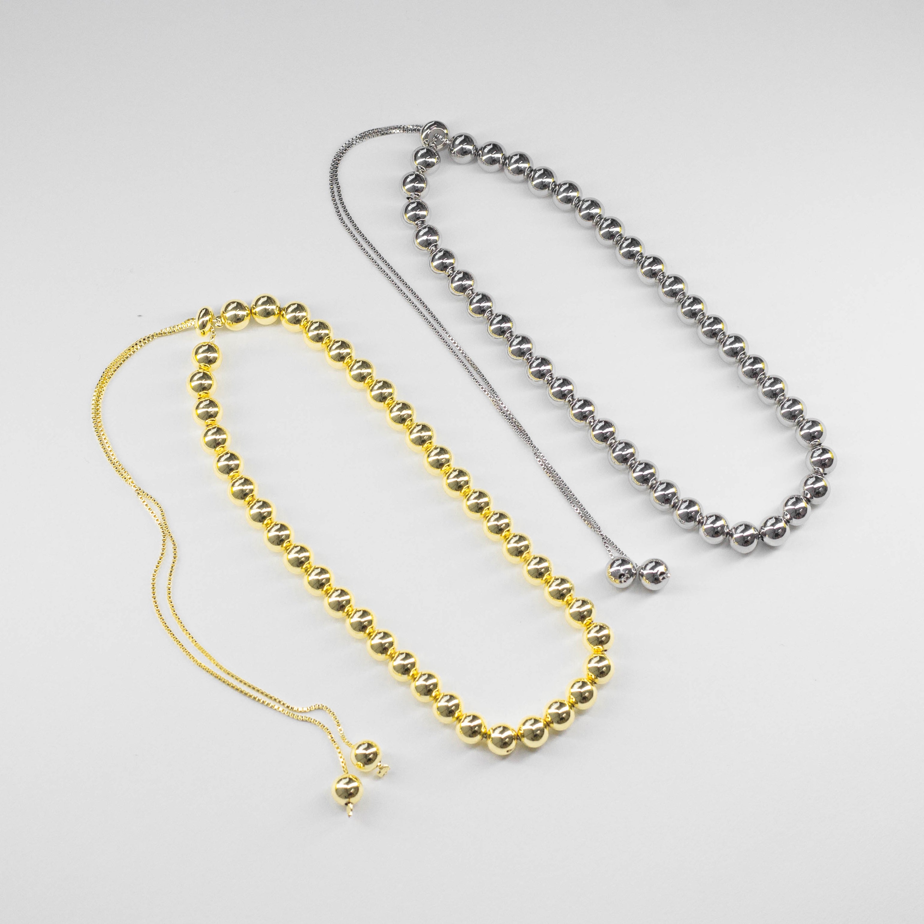 Set de Gargantillas de Esferas Ajustables Tono Oro y Plata