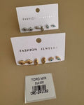 Set de Aretes Topo Mix Diseño Ojos con Incrustaciones