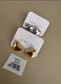 Aretes Corazón con Lazo Decorativo