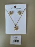 Set de Collar y Topos con Flor Brillante