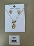 Set Collar y Aretes Religiosos con Detalle de Piedras