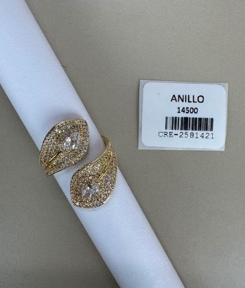 Anillo ajustable dorado con cristales y formas orgánicas