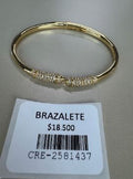 Brazalete Dorado con Cilíndricos de Pedrería
