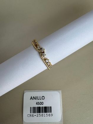 Anillo Ondulado con Piedras Brillantes y Oscuras