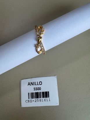 Anillo Dorado con Diseño de Lazo y Circones