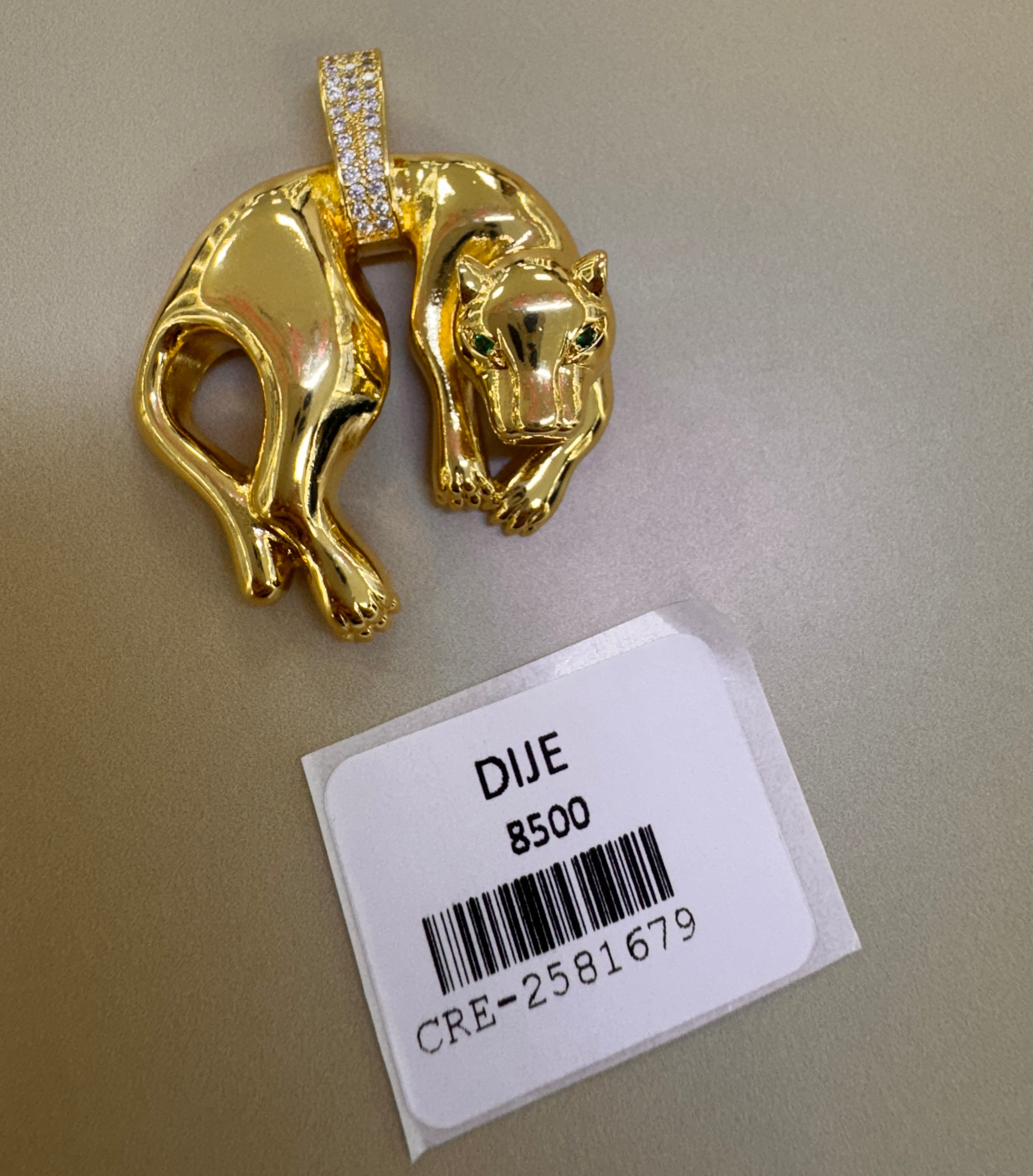Dije Pantera en Tono Dorado con Piedras Brillantes