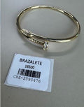 Brazalete Dorado Forma Clavo Liso con Piedras