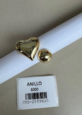 Anillo dorado con motivo de corazón y esfera