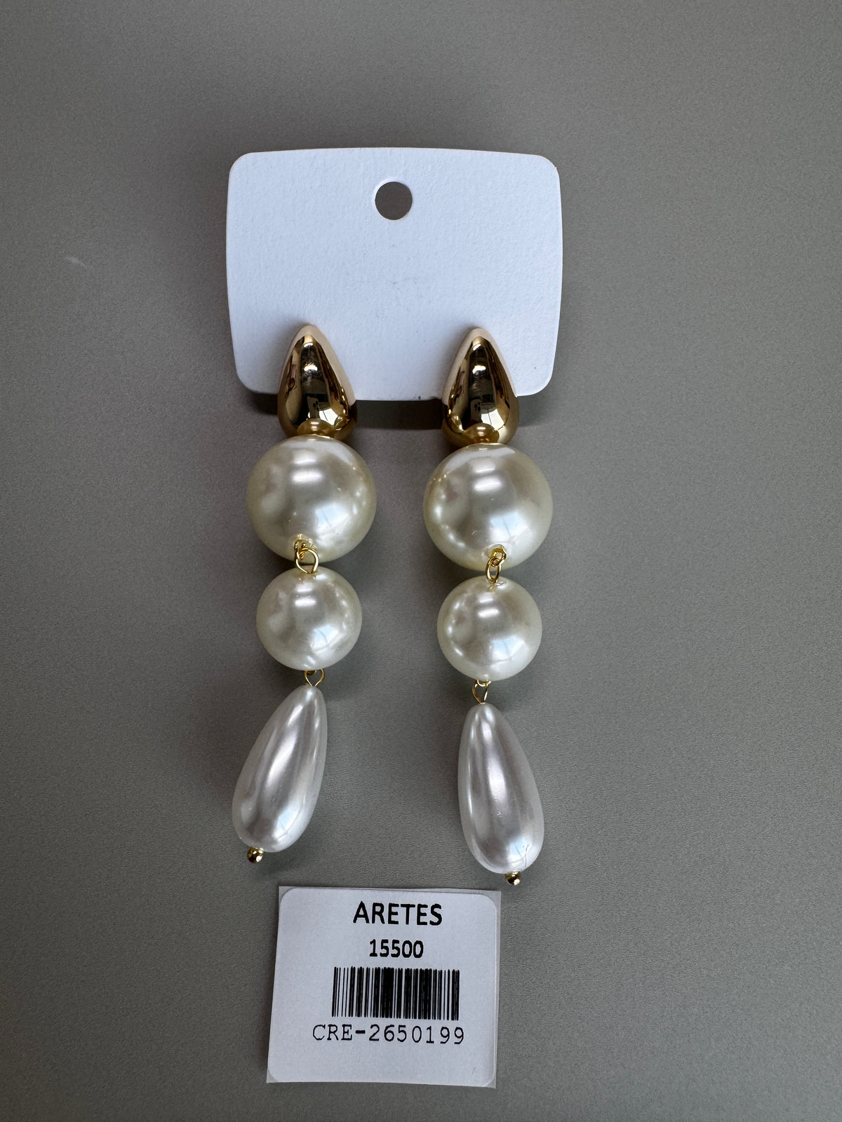 Arete largo dorado gota perla