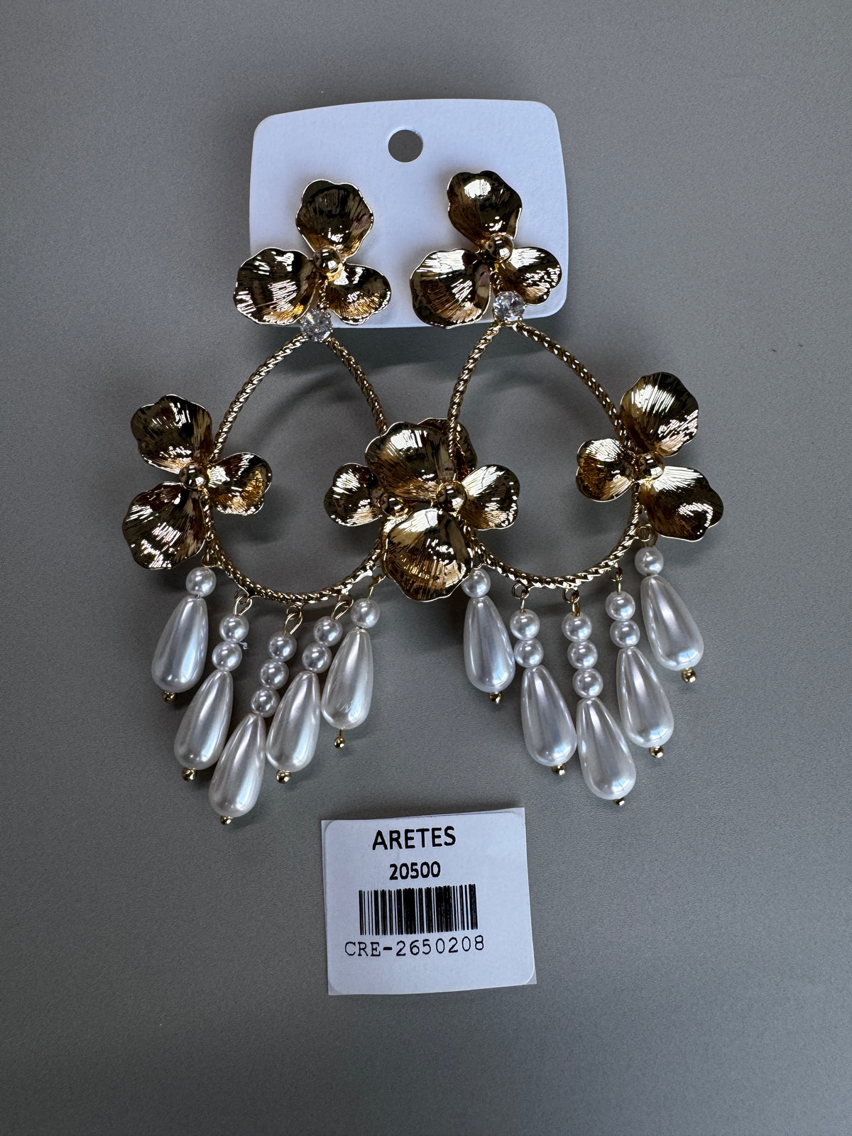 Arete largo dorado flor perla