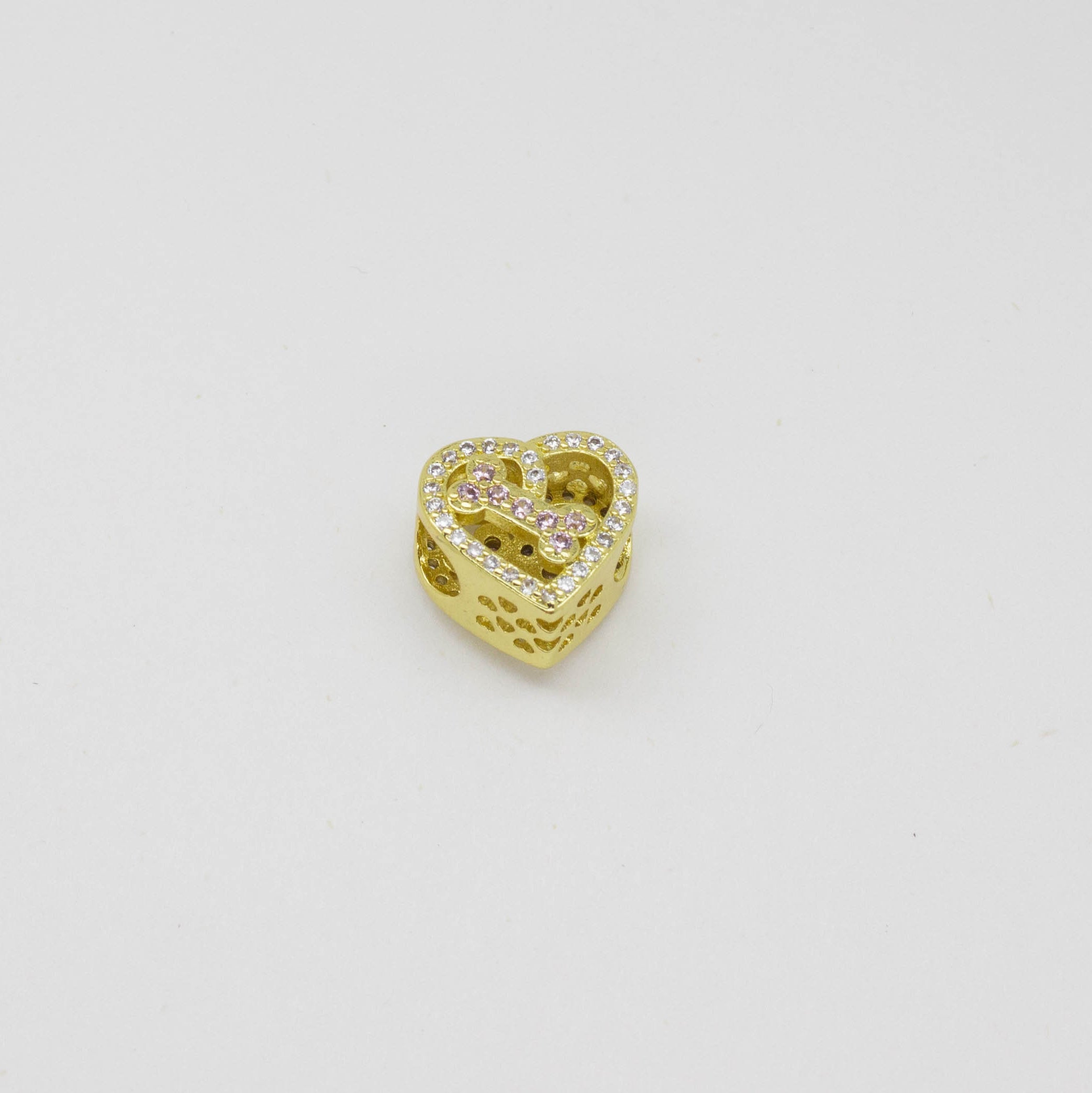 Dije Charms Corazón con Detalle de Hueso en el Centro