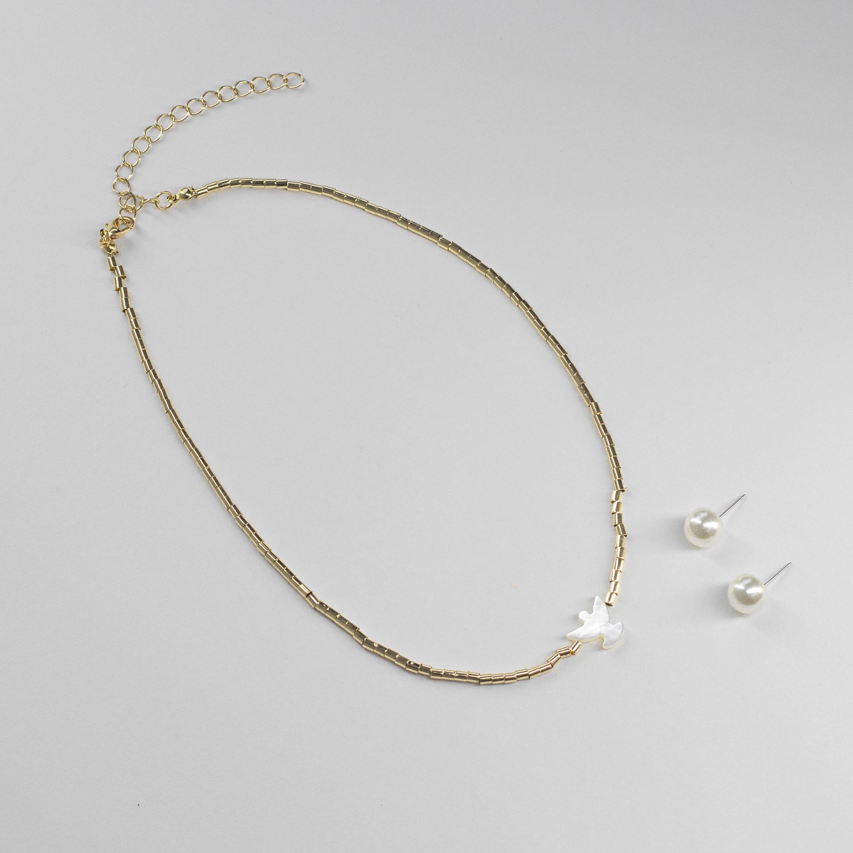 Juego de Collar con Dije de Ave y Topos de Perla