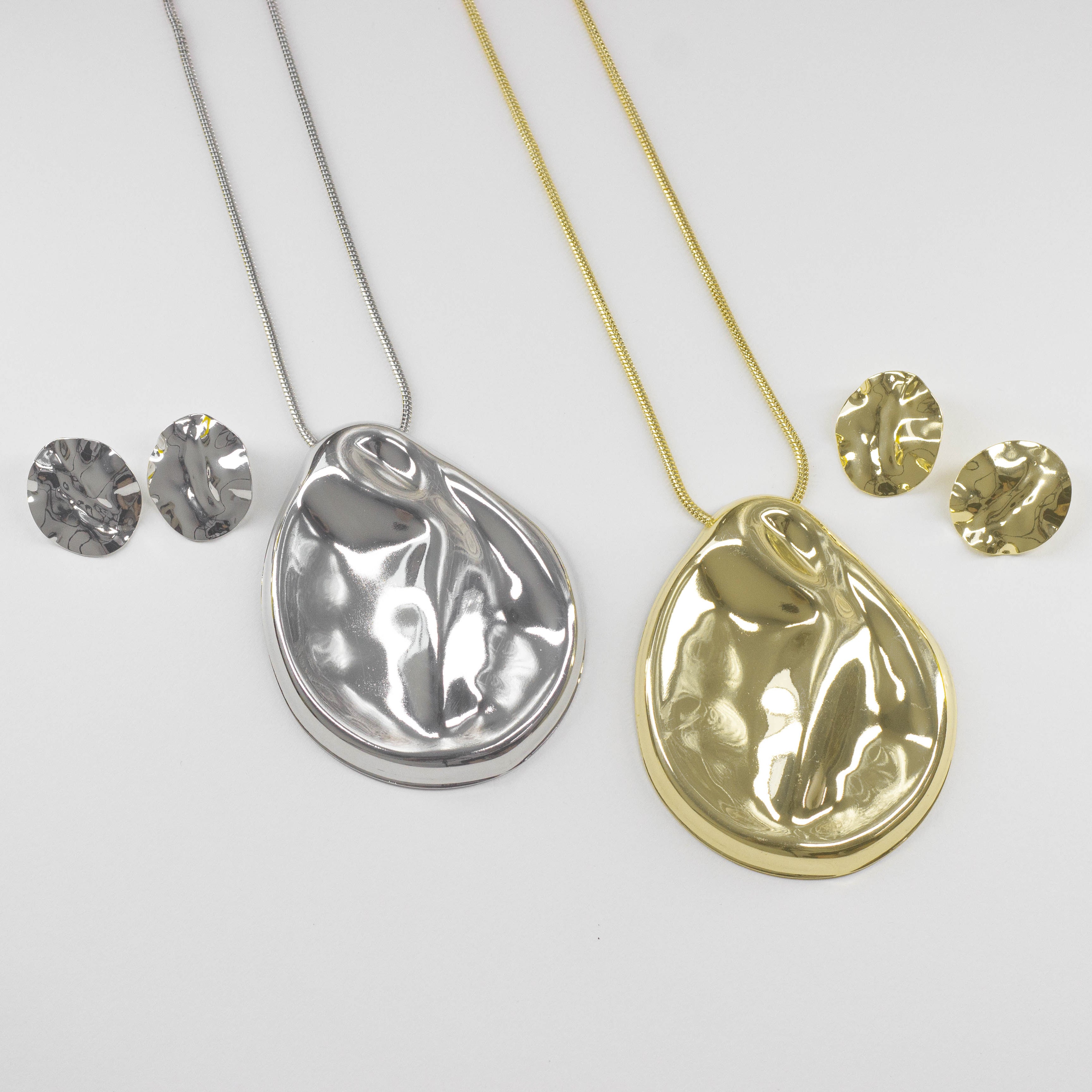 Juego de Collar y Aretes con Dije Irregular
